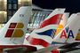 Logos d'Iberia, British Airways et American Airlines