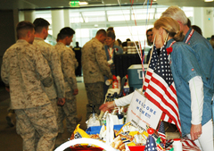 Armed Forces Service Center Troop Greeters Welcome 100(th) Military Flight at MSP